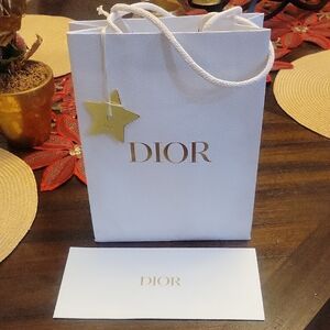 Dior White Bag with Gold Star Tag